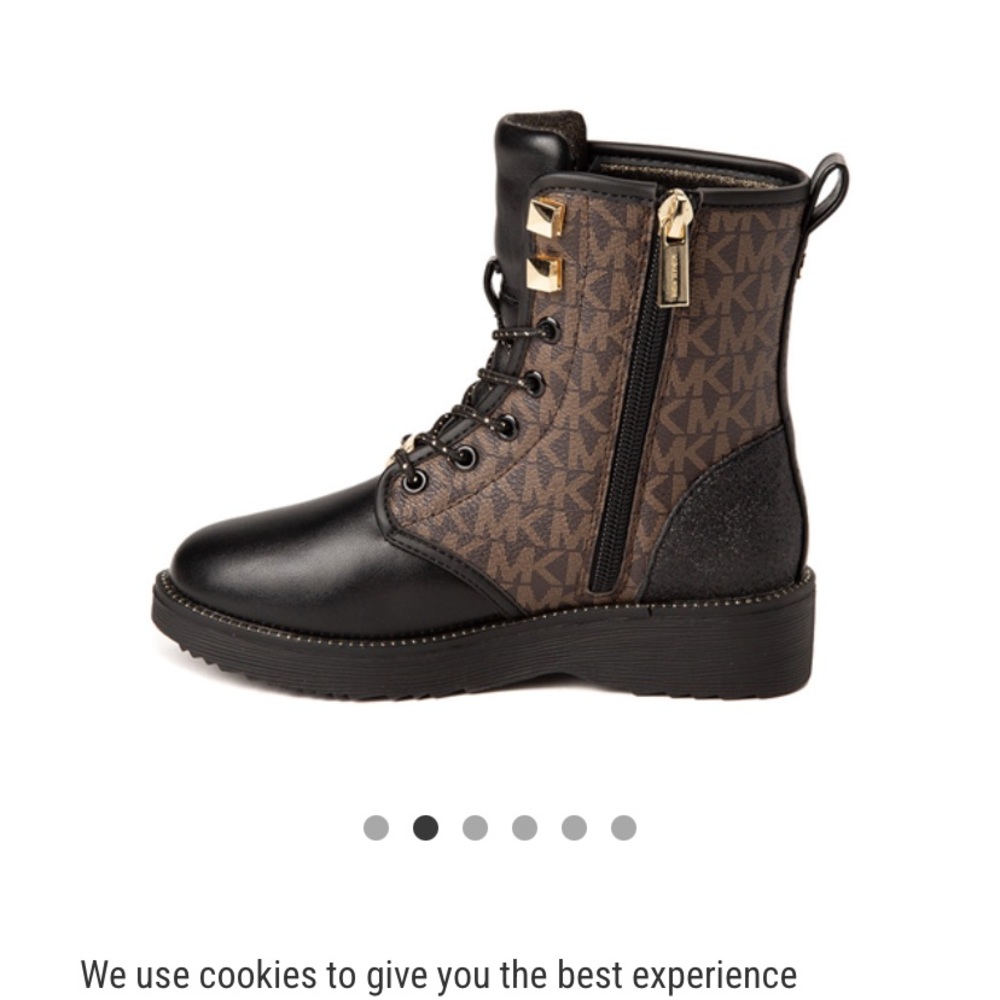 Michael Kors, Haskell boots Black and Gold.